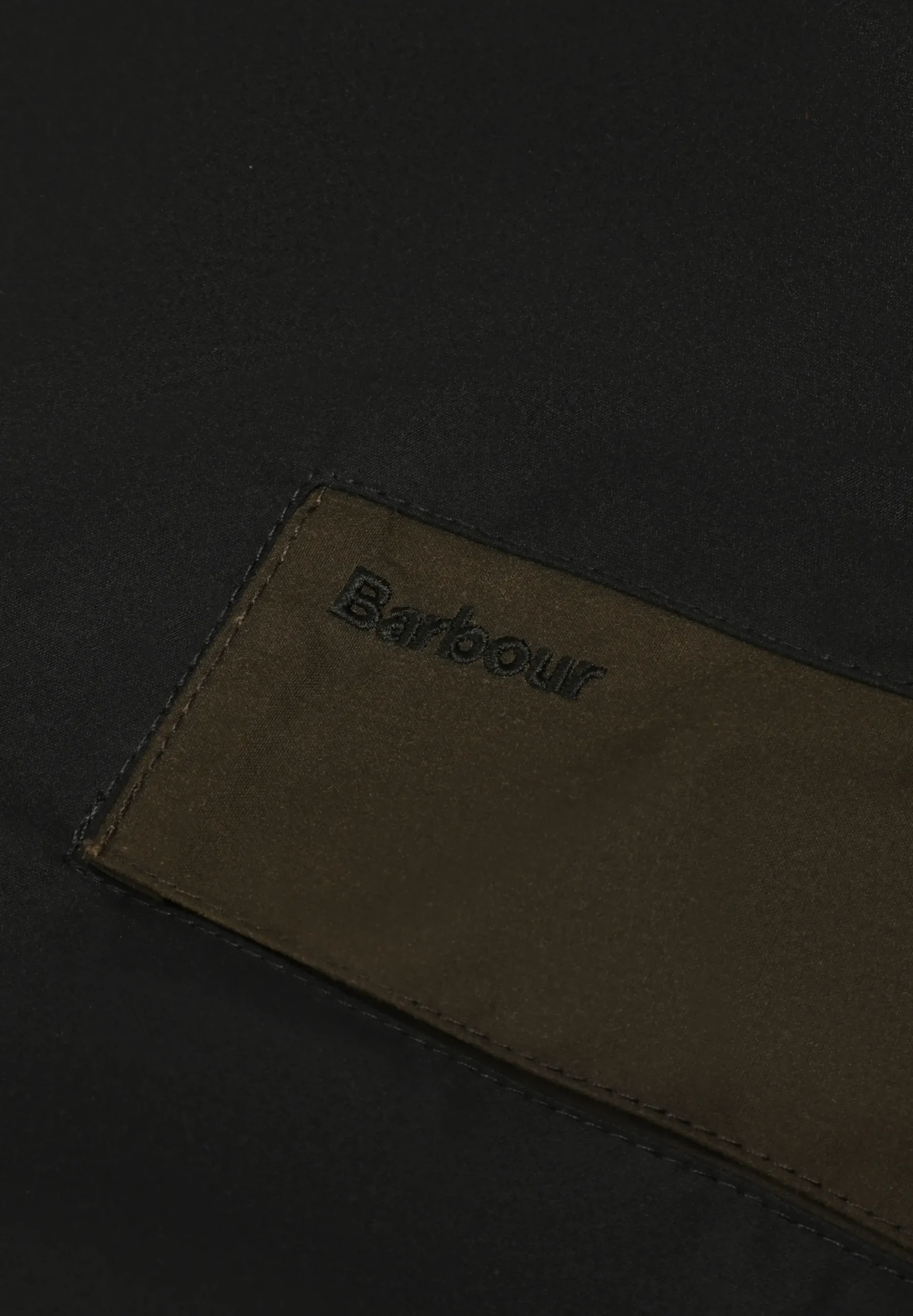 BARBOUR | CHAQUETA ENCERADA PATCHWORK TRANSPORT