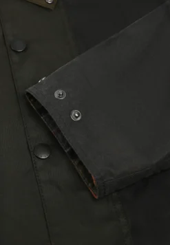 BARBOUR | CHAQUETA ENCERADA PATCHWORK TRANSPORT