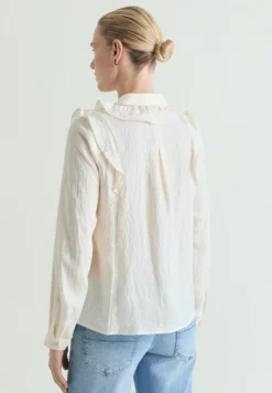 BLUSA DETALLE VOLANTES
