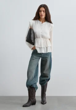BLUSA PLISADA VOLANTES