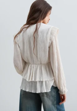 BLUSA PLISADA VOLANTES