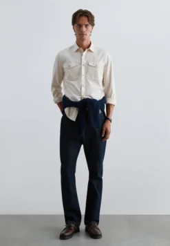 CAMISA BOLSILLOS CON BOTONES