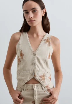 CHALECO DENIM BORDADOS FLORALES