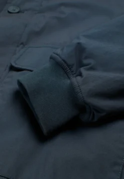CHAQUETA ABOTONADA BOLSILLOS