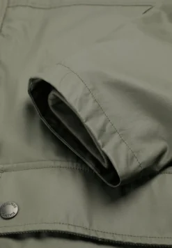 CHAQUETA ENCERADA CON SNAPS