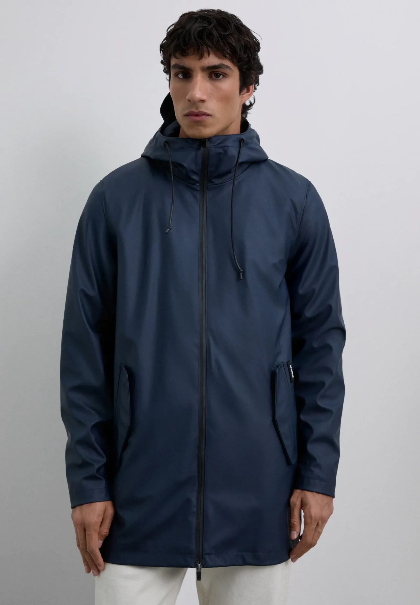 CHAQUETA IMPERMEABLE LOGO
