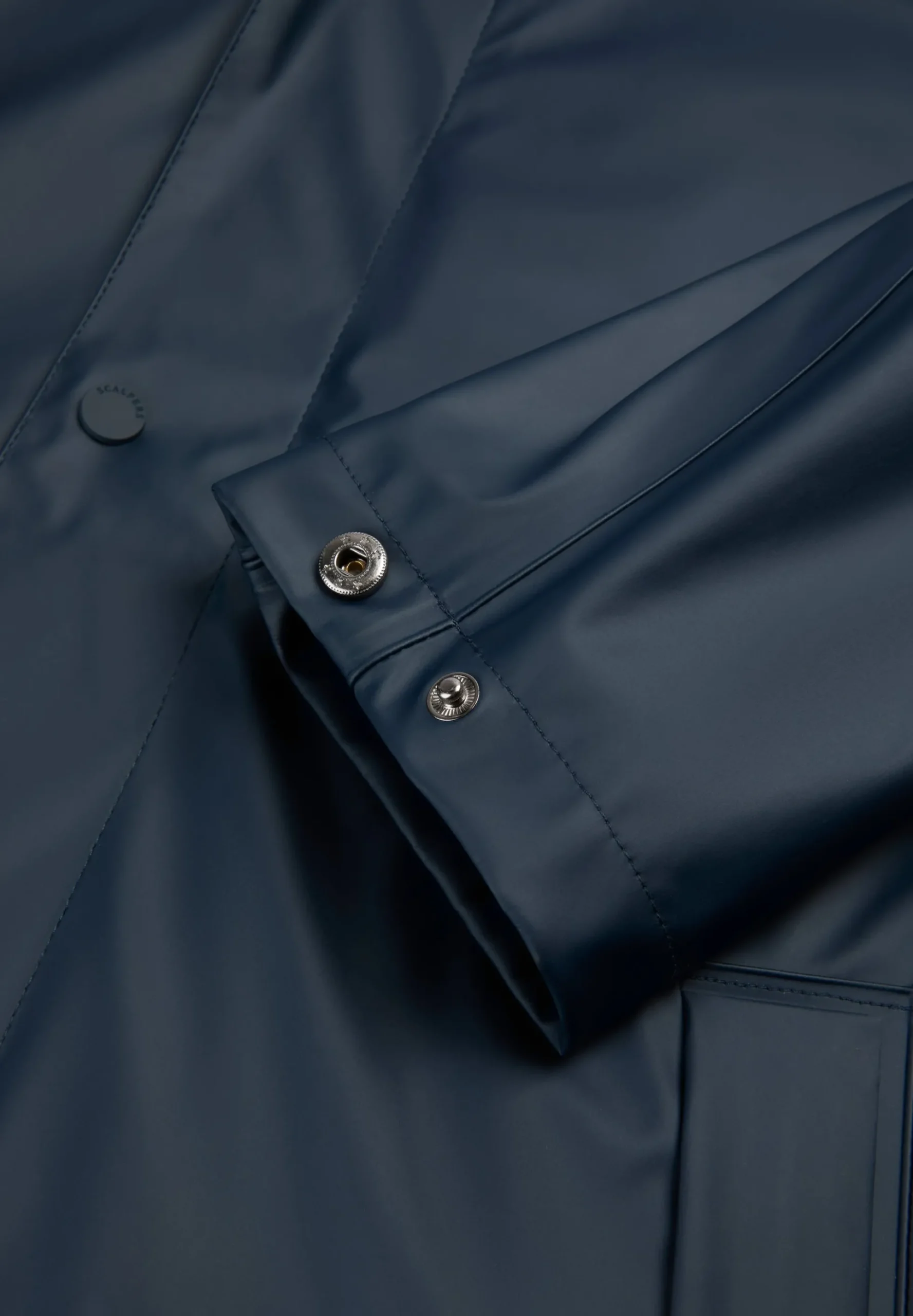 CHAQUETA IMPERMEABLE LOGO