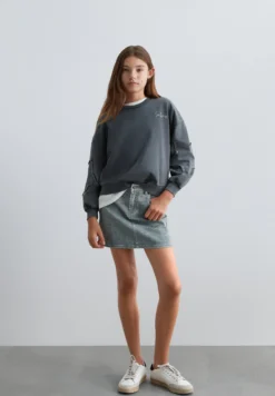 FALDA CORTA DENIM ESTAMPADA