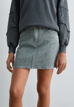 FALDA CORTA DENIM ESTAMPADA