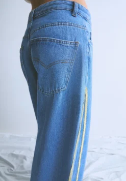 JEANS TIRAS LATERALES