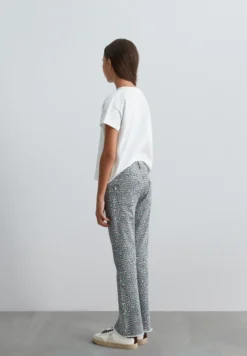 PANTALÓN FLARE ESTAMPADO ANIMAL