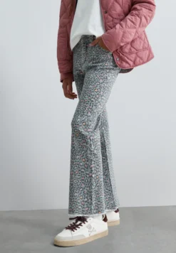 PANTALÓN FLARE ESTAMPADO ANIMAL