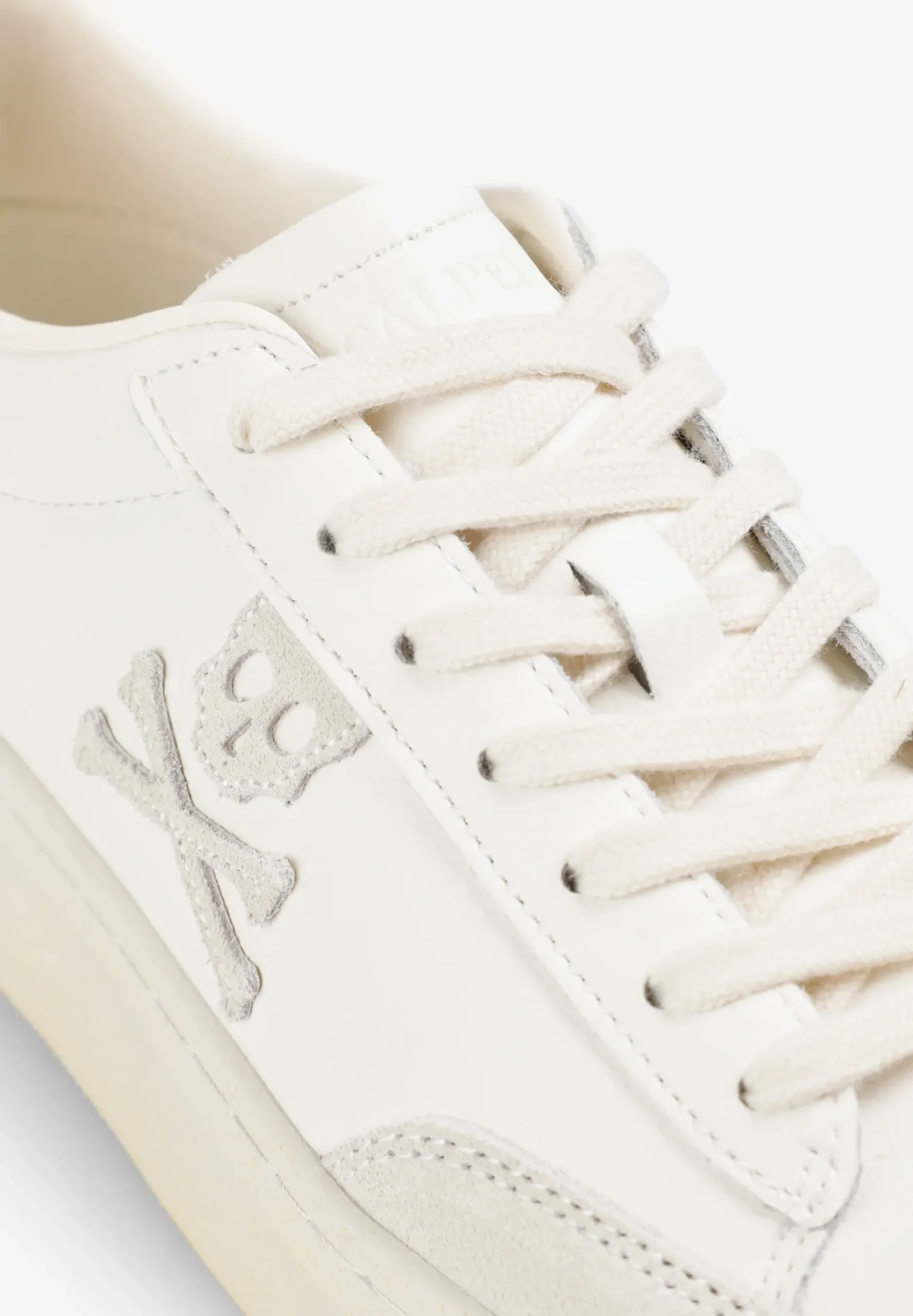 SNEAKERS BAJAS CALAVERA LATERAL