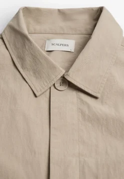 SOBRECAMISA TÉCNICA BOLSILLOS