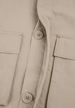 SOBRECAMISA TÉCNICA BOLSILLOS