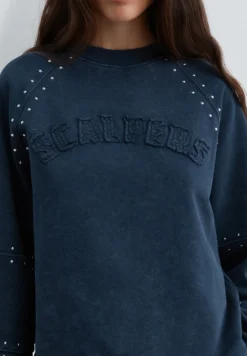SUDADERA STUDS LOGO PARCHE