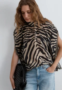 TOP FLECOS ANIMAL PRINT